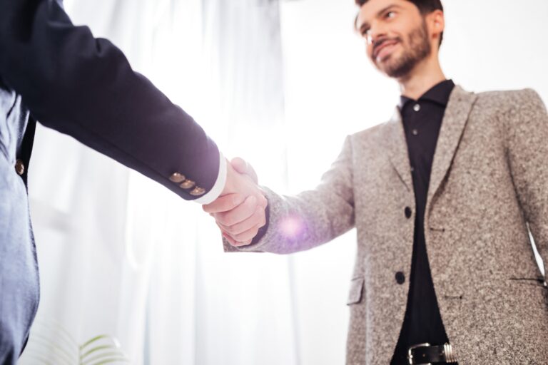 close-up-photo-of-men-business-handshake-in-office-2021-08-30-02-30-49-utc-min